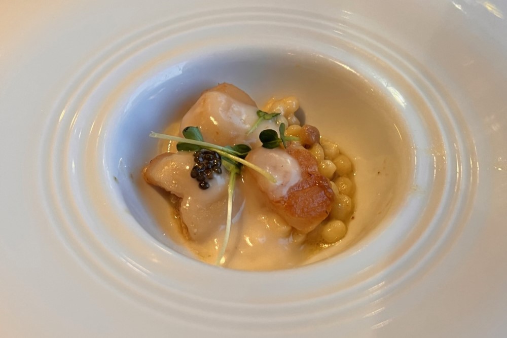 Seared Scallops with toasted Sardinian Fragola Risotto and caviar on atlas ocean voyages