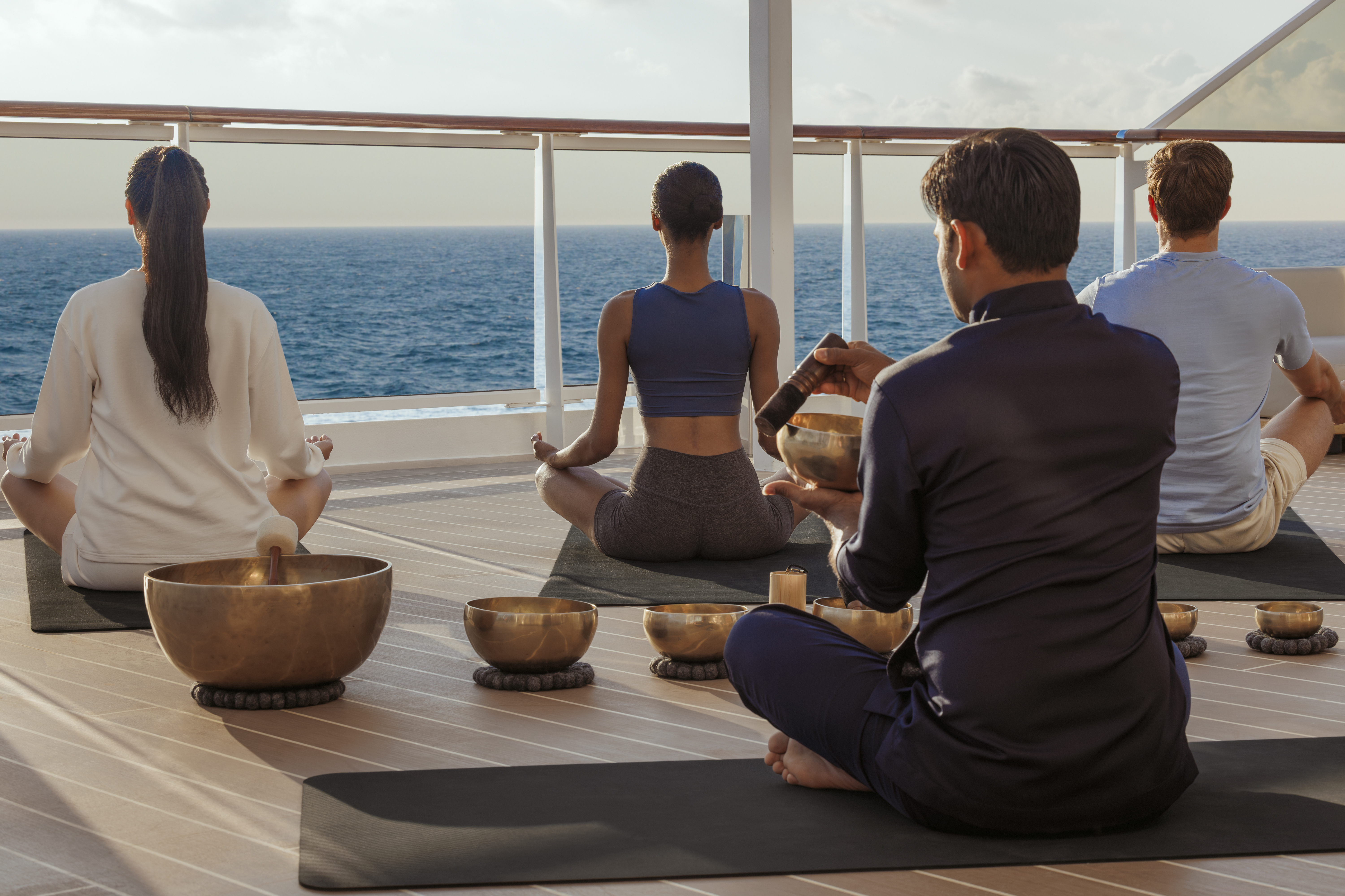 Explora Journeys cruisers at a yoga class