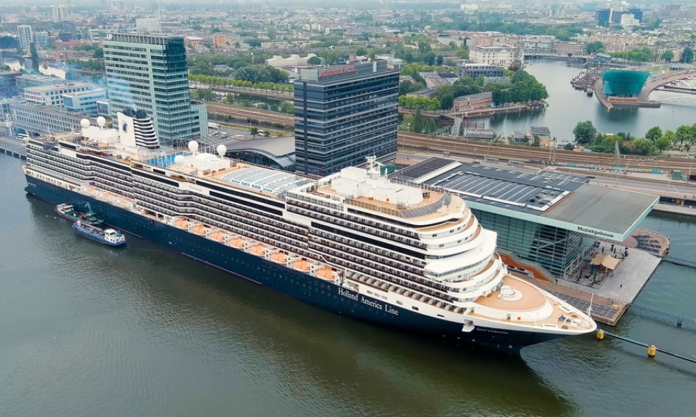 holland america cruise ship docked at the port of amsterdam