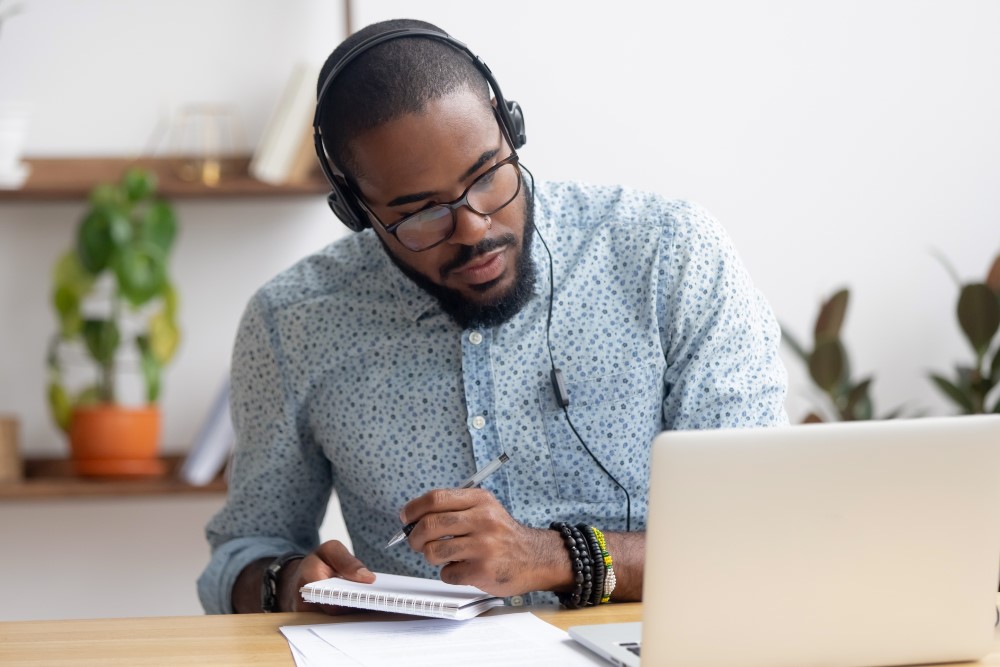 black man doing online learning