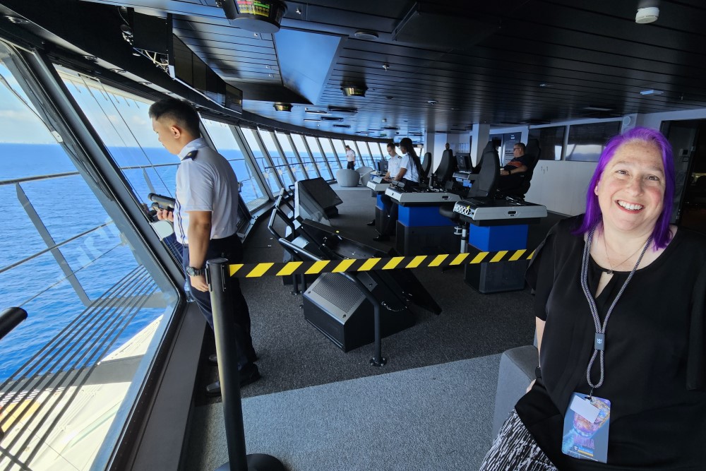 dori saltzman on the bridge of utopia of the seas cruise ship