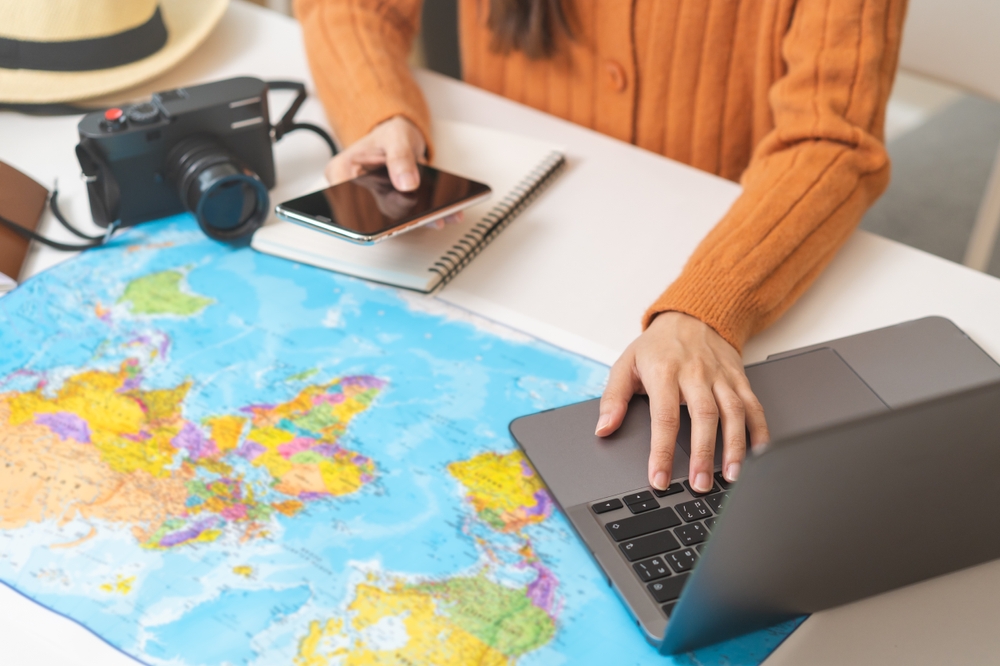 Travel agency owner working at her desk