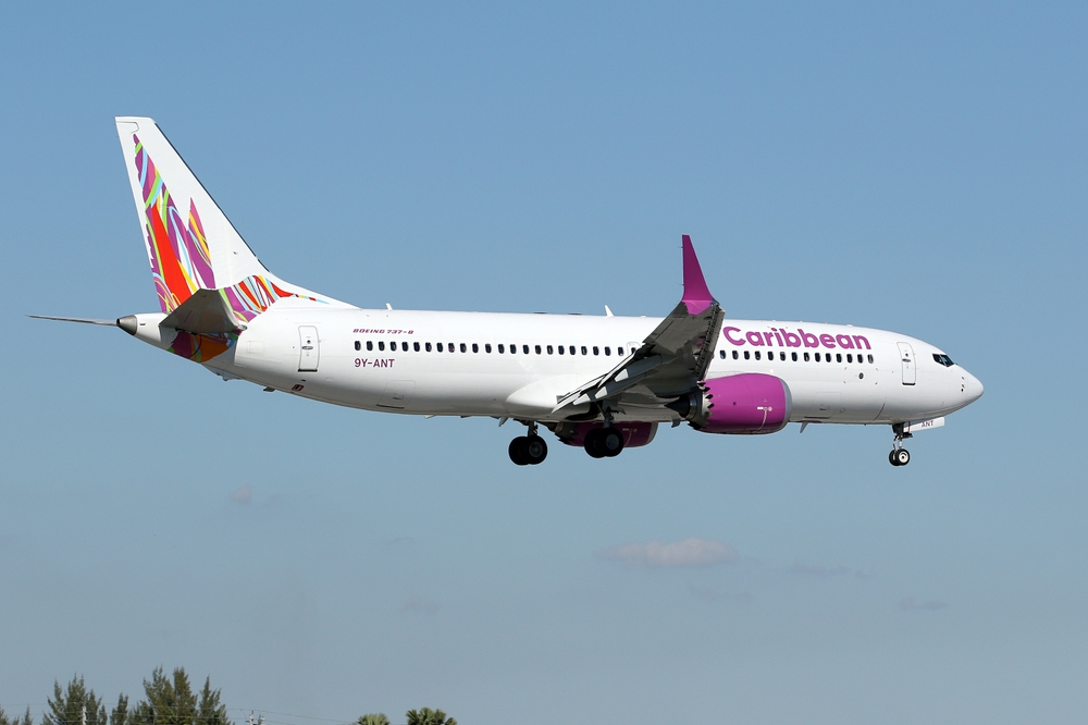 A Caribbean Airlines Boeing 737 MAX8 landing at the Miami International Airport