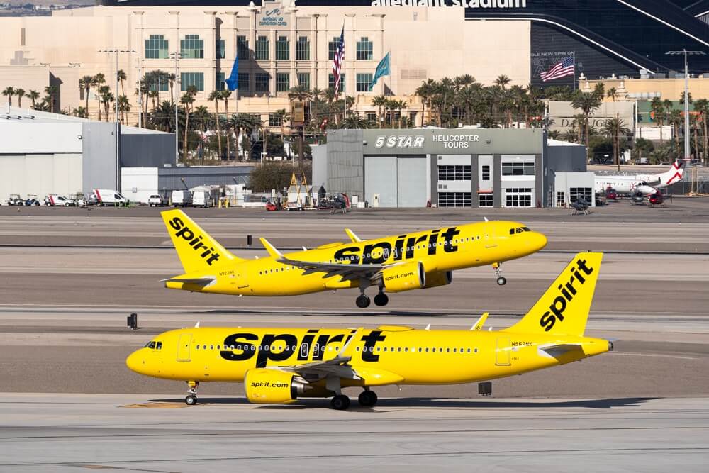 Two Spirit Airlines planes on Runway one taking off in Las Vegas